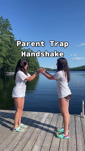 Our twins recreating The Parent Trap handshake🤎🤍 #parenttrap #theparenttrap #parenttrapmovie #fyp #summer #sleepawaycamp #campwalden #bunk #camp
