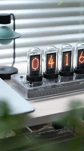Imagine a clock that captures the charm of vintage Nixie tubes, but powered by modern technology within. | Atomic Voyage | Facebook