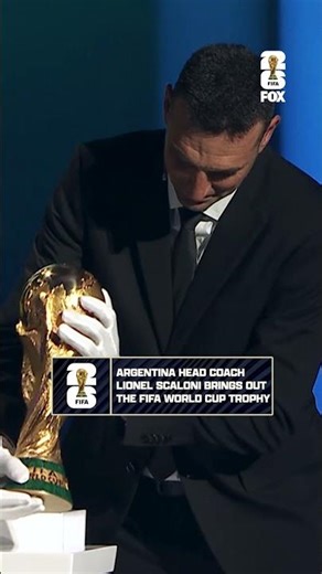 Argentina's 2022 FIFA World Cup coach Lionel Scaloni brings trophy ahead of 2026 FIFA World Cup Draw