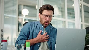 Closeup of working bearded man in glasses, difficulty breathing or chest pain, touches his chest with hand. Heart attack, thoracic osteochondrosis, panic attack concept. Trouble breathing, chest pain.