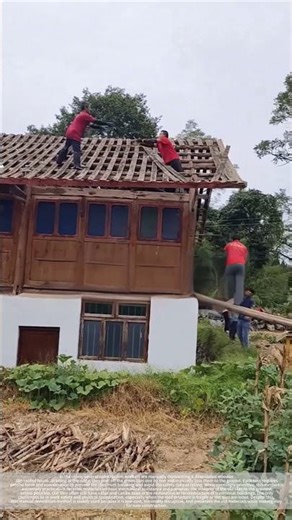 The process of manually transferring roof tiles during roof tile removal
