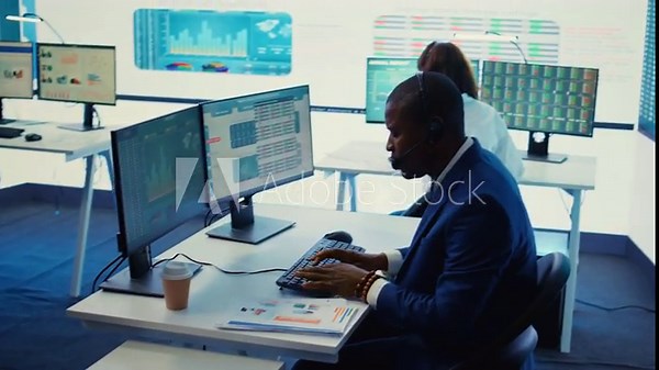 General director examining statistics big data on computer in a control room, makes a briefing report. Business manager studying sales numbers to adapt within market conditions. Camera B.