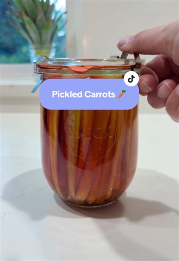 Pickled Carrots 🥕👩🏻‍🌾 Recipe for a 1 L jar or 1 Quart Jar: Carrots to fill the space 250 ml Rice Vinegar 250 ml Water 3 inch piece of fresh Ginger 2 Garlic cloves 1 jalapeño 2 tablespoons Honey 1 teaspoon salt