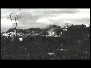 Wrecked Japanese airplanes and hangars on Japanese airfield at Peleliu Island, Pa...HD Stock Footage
