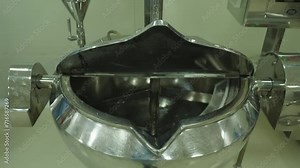 A laboratory planetary mixer mixes the chemical components.