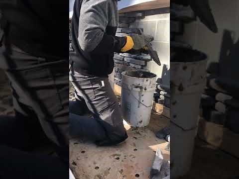 Stack A Stone, laying stone veneer around a foundation block wall