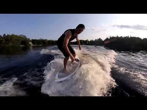 Wakesurfing behind jetski