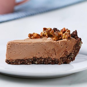 636K views · 1.2K reactions | I could watch them add the crispy rice topping to this pie all day 襤 Recipes: https://tasty.co/recipe/cocoa-crispy-rice-chocolate-hazelnut-mousse-pie | Tasty | Facebook