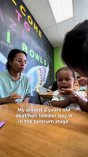Using ASL with his favorite book helps soothe Jabez! 🙌🏽