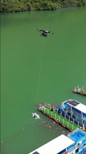 DJI FlyCart 100 lifting trash from a river 🚮 🏞️ Heavy lift delivery drone in action