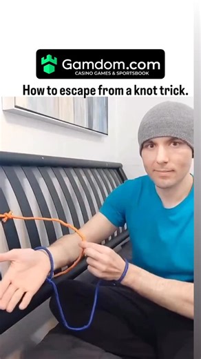 Snapbuzz_official on Instagram: "- The post features a viral video tutorial on escaping a loosely tied wrist restraint by manipulating slack in the orange ropes, pulling them apart to slip free in under 15 seconds. - Posted by @DOGE__news, a culture and politics account, this off-topic life hack has driven 539k views and 2k likes, sparking humorous replies questioning its practicality in real kidnappings. - Rooted in basic knot theory, the trick exploits directional tension for release but, per