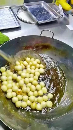 Cooking Soft, Plump Food Items in a Large Pan
