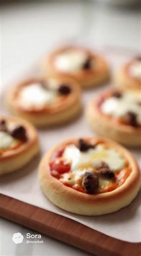 🍕 Mini Pizzas Ingredients Dough: \t•\t200 ml warm milk \t•\t200 ml warm water \t•\t1 tsp dry yeast \t•\t1 tsp sugar \t•\t560 g flour \t•\t2 tbsp olive oil Toppings: \t•\tTomato sauce \t•\tSausage, sliced \t•\tCherry tomatoes, halved \t•\tFresh mozzarella \t•\tFresh herbs (optional) Минни пицца 🍕 Ингредиенты: Молоко-200 мл Вода-200 мл Дрожжи-1 ч.л Сахар-1 ч.л Соль-0,5 ч.л Мука-560 г Оливковое масло-2 ст.л Начинка: Калбаса Моцарелла Помидоры Черри Зелень по желанию #asmr#миннипицца#рецепты#pizza
