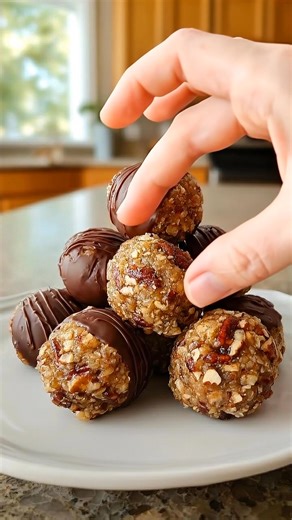 Pecan Pie Balls (No-Bake) These Pecan Pie Balls are a fast, no-bake dessert packed with sweet, nutty richness, capturing the cozy taste of classic pecan pie in small, poppable bites. Ideal for gatherings, celebrations, or whenever you crave an easy, indulgent treat without turning on the oven. Ingredients 2 cups pecans, toasted and finely chopped 1 cup graham cracker crumbs 1 cup brown sugar, packed 1/2 teaspoon salt 2 tablespoons maple syrup 4 oz cream cheese, softened 1 teaspoon vanilla extrac