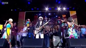 Good Times...when Nile Rodgers and Chic got the Glastonbury audience up on stage to dance (and can you spot a certain Radio 2 presenter up there with him?) | BBC Radio 2