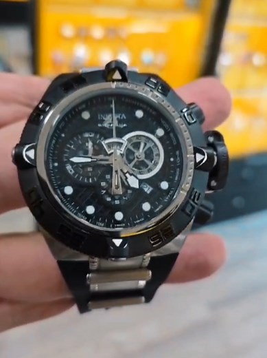 Step into unrivaled power with the Invicta Subaqua Noma IV. A watch crafted to withstand the depths and built to make a statement. 🌊 🕒 5050.E Quartz Movement: Precision-driven by Swiss engineering, with a 30-minute chronograph function for added versatility. ⌚ Case: Sturdy 50mm Stainless Steel in Steel and Black, boasting a solid 20mm thickness for a robust presence. ⚙️ Bezel: Dual-tone Steel and Black Stainless Steel, giving this timepiece a rugged yet refined edge. 🎨 Dial: Bold Grey and Bla