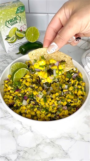 Roasted Chili-Corn Salsa Copy cat recipe ft. True Lemon Lime Packets - Find True Lime Crystallized Lime Packets at your local Publix & Walmart - #cornsalsa #salsa #chipotle #copycatrecipes #easyrecipes #cilantro #truelime #truelemonpartner | Dipped Tampa
