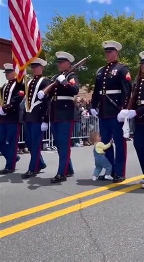 🥁 Tiny Girl Escapes Crowd & Marches Into Military Formation!#funnykids #ViralShorts #shortsviral