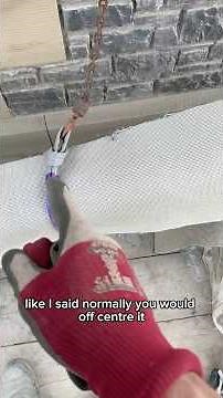 Building a stone lintel with a block and tackle