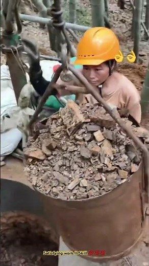 Hand digging deep hole with simple garden tool