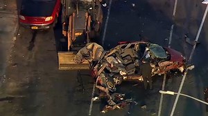 Passenger killed, driver hurt when car crashes into backhoe in Brooklyn