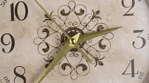 retro style wall clock time to walk slowly Shoot in a slow motion See the second hand slowly moving in circles with the mechanism of the watch.