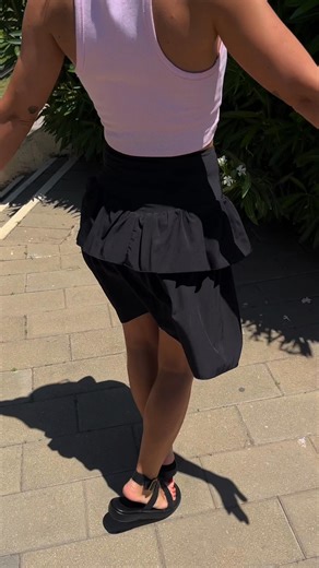 230K views |  The Skirt That Does It All  Nice enough for summer & Functional enough for training. Meet your new go-to: the Black Ruffle Tennis Skirt. ✔️ Built-in shorts for confidence ✔️ Sweat-wicking & squat-proof ✔️ High-waisted with soft stretch ✔️ Ruffle hem = instant outfit upgrade ✔️ Perfect for workouts or weekend plans  “So flattering, I wear it everywhere – gym, errands, even brunch!” | BARA Sportswear | Facebook