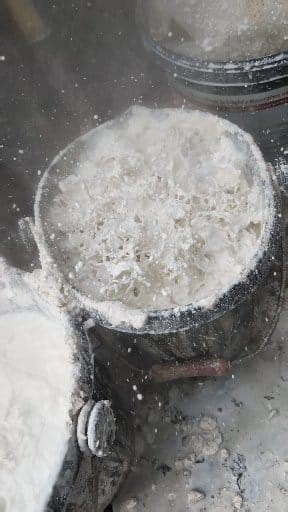 Savage Quick lime exothermic reaction 🔥 Can't deny this is my most enjoyed part of traditional mixes... I feel like a mad scientist 😂 With the reintroduction of water - quick lime kibble can reach temperatures exceeding 300-400 degrees. Free lime (hot lime putty) is so fantastic to work with as it bonds well with the aggregates creating a incredibly sticky and open poured mortar allowing for maximum moisture wicking It goes off by being open to the air and carbonating which essentially will re