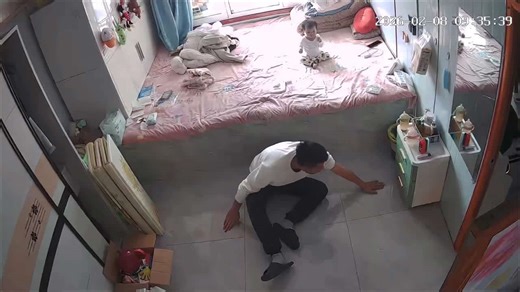 Dad's superhuman reflexes save baby falling off bed