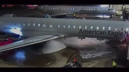 Aircraft fueler hose malfunctions at Dallas airport. The X post shares a 69-second video of a ground crew worker at Dallas Fort Worth International Airport losing control of a high-pressure jet fuel hose on October 11, 2025, spraying flammable fuel near an American Eagle aircraft while attempting to manage the spray. Public reactions in replies highlight concerns over worker training and safety protocols, with over 430 responses criticizing the failure to immediately shut off the valve and specu