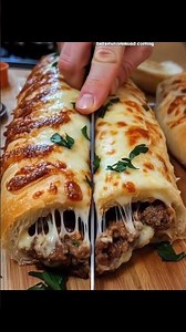 Cheesy Ground Beef Stromboli | Recipe in bio