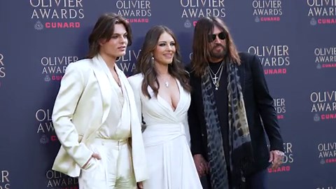 Elizabeth Hurley and Billy Ray Cyrus lead the best-dressed stars in first public appearance after 5 months at the Olivier Awards