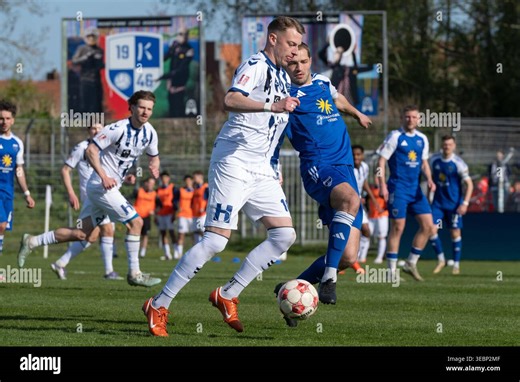 April 26, 2026, Ostfriesland Stadium, Emden, GER, RLN, BSV Kickers Emden vs VfB Oldenburg, DFL regulations prohibit any use of photographs as image sequences and/or quasi-video, In the picture Julian BOCCACCIO (VfB Oldenburg #10) Marten SCHMIDT (BSV Kicker Stock Photo - Alamy