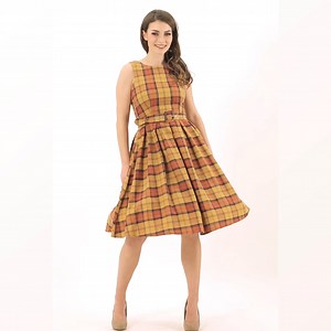 33 reactions · 4 comments | We ❤ pretty tartan dresses!  Get your sweet retro chic look with this new gorgeous yellow tartan style  See more tartan dresses here: https://bit.ly/3fBvxWn | Dolly and Dotty | Facebook