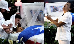 Agony of mother of slain boxing champion Hector 'Macho' Camacho as she lays out her son's body during open-casket wake