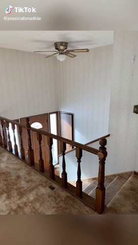 Entryway remodel! I did not love the split entry in this house but I loved how it turned out when we finished it! The space felt closed off and cramped so my goal was to open it up to be inviting! We opened up the coat closet and put hooks & a bench, took out the closet at the top of the stairs, added a window above the door, and redid the railing! And of course new stair treads, added shiplap, trim, and paint! #diyproject #diyrenovation #diyremodel #diyreno #splitentryremodel #entrywayremodel #