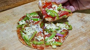 3.2M views · 1.4K shares | Homemade Thin Crust Pizza on Tawa - 5 minute effort recipe ( using Gehu Atta or Whole Wheat Flour ) Lets make it at home and not order from outside! Its easy, tasty and you can eat as much as you want! 1. If you don't have cheese, you can replace it with homemade paneer! 2. If you don't have butter , you can use ghee also! | Zayka Ka Tadka | Facebook