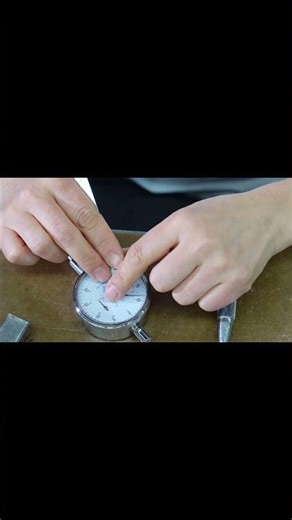 Calibrating precision: A close look at the finishing touches on our dial indicators.