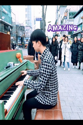 Public Piano Performance Captivates Street Audience