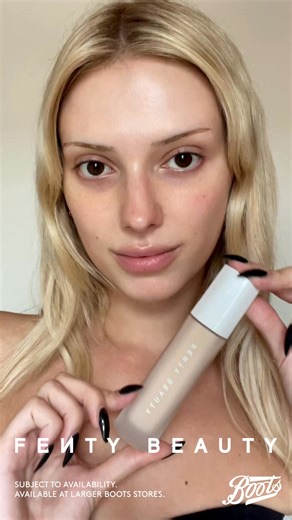 Danielle wears Fenty Beauty Soft'lit Foundation paired with NEW! Grip Trip Hydrating Primer. Subject to Availability. Available at larger Boots stores. | Boots UK