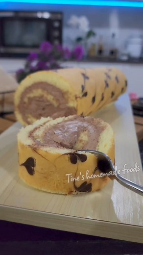 835K views · 6.8K reactions | Soft and Fluffy Cake Roll Ingredients - 3 egg yolks - 1 teaspoon vanilla extract - 1/8 teaspoon salt - 1/4 cup sugar - 1/4 cup vegetable oil - 1/4 cup milk - 1 cup cake flour(114g) - 1 teaspoon baking powder - 3egg whites - 1 teaspoon lemon juice - 1/4 cup sugar - 1 teaspoon cocoa powder Chocolate Ganache - 1 cup liquid whip cream /heavy cream - 1/2 cup chopped dark chocolate(85g) | Tine's Homemade foods | Facebook