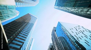 Smooth low angle tracking shot of office buildings. Low angle office building tracking shot. Beautiful and smooth. Good for video establishing shot, video opening or closing.