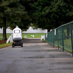 Please welcome to the tee, Roxo! Roxo delivered the 🏆 to the first tee at the TOUR Championship, with some help from 2020 #FedExCup Champion Dustin Johnson. | FedEx