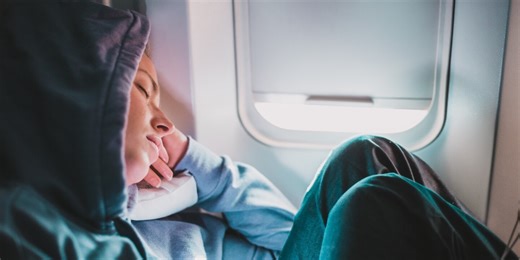 Does Melatonin Really Help You Sleep on a Flight? We Asked Medical Experts