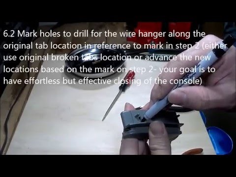 Tacoma center console latch repair using wire hanger