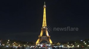 TIME-LAPSE: Eiffel Tower illuminates with lights at night in Paris