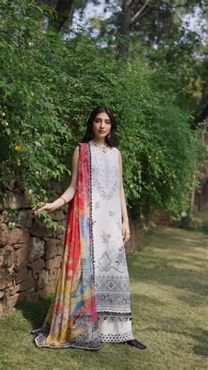 Lunara (Code:D-01) Exuding refined sophistication, this ensemble features a white base beautifully detailed with intricate black embroidery, creating a striking contrast. The look is elevated with a shikargah-themed chiffon dupatta in a bold red hue perfectly complementing the white canvas. Delicately adorned sleeves add a graceful finishing touch, blending timeless tradition with contemporary elegance. Coming Soon! #republicwomenswear #ayezakhan #summerlawn #unstitched #lawn #republiclawn #sana