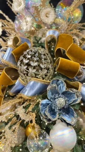 Farrisilk Ribbon on Instagram: "✨Gilded Galerie✨ 🪄Go behind the making of the magic. Cool steel blue is warmed up by antique gold, creating a palette that feels polished and graceful with a touch of fairytale-like glamour. Tiffany steel blue and plush antique gold velvet ribbons came to life with golden Pearl Garland and piercing steel blue Pendeloque jewel ribbons. The designers behind one of our premier retail partners @craftexinc helped bring this exhibition of winter luxury to life. Stop by