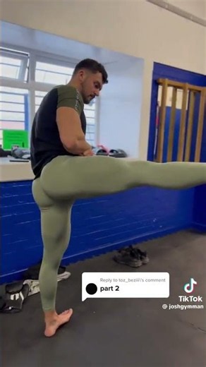 Bubble Tight Male Muscle Butt Booty🍑🔥 : man in gym tights in gym doing extreme leg stretch on bar 🍑🔥