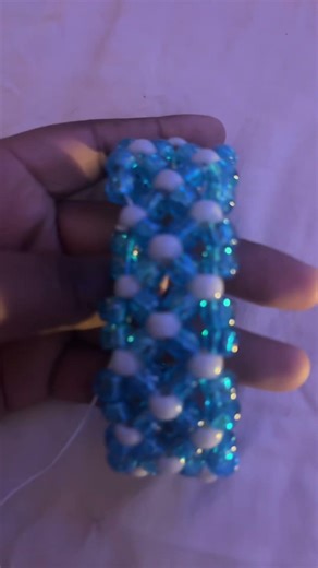 Making this cool Kandi cuff while following a tutorial by @KandiQueerdo17 #kandikid